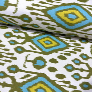 Turquoise, lime & olive green ikat aztec patterned upholstery fabric.