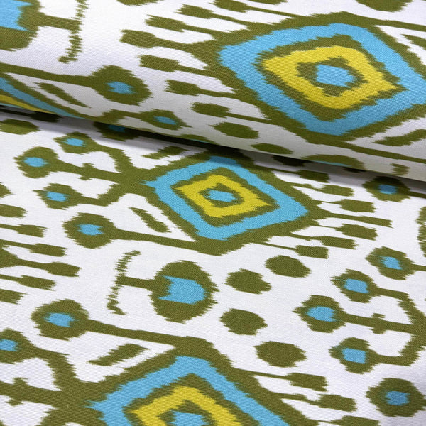 Turquoise, lime & olive green ikat aztec patterned upholstery fabric.