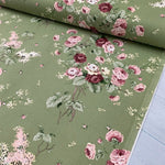 Pink and burgundy roses on moss green fabric. Shabby chic olive upholstery fabric.