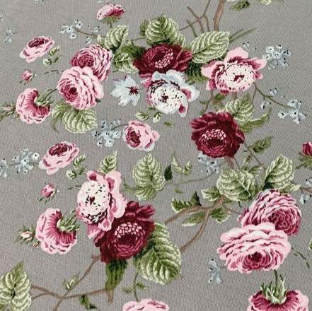 Pink and maroon flowers and green leaves print grey upholstery curtain fabric.