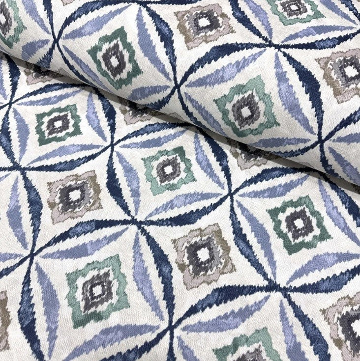 Indigo blue green grey white ikat pattern cotton canvas upholstery fabric.