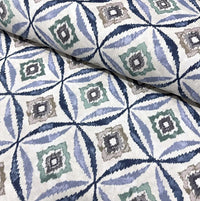 Indigo blue green grey white ikat pattern cotton canvas upholstery fabric.