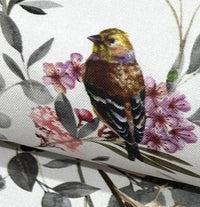 Brown bird print floral upholstery fabric.