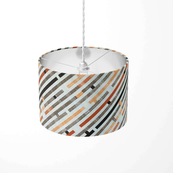 Maze patterned ceiling lampshade on a white background.