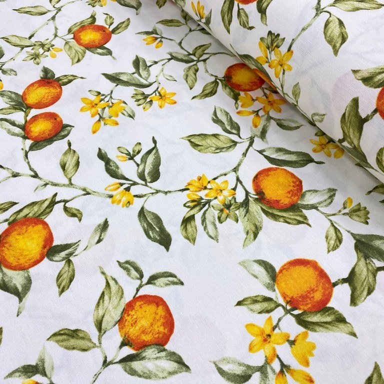 Orange and green upholstery fabric printed with orange fruits blossoms and green leaves on white background