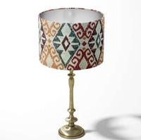 Table lampshade with an aztec kilim pattern on a white background.