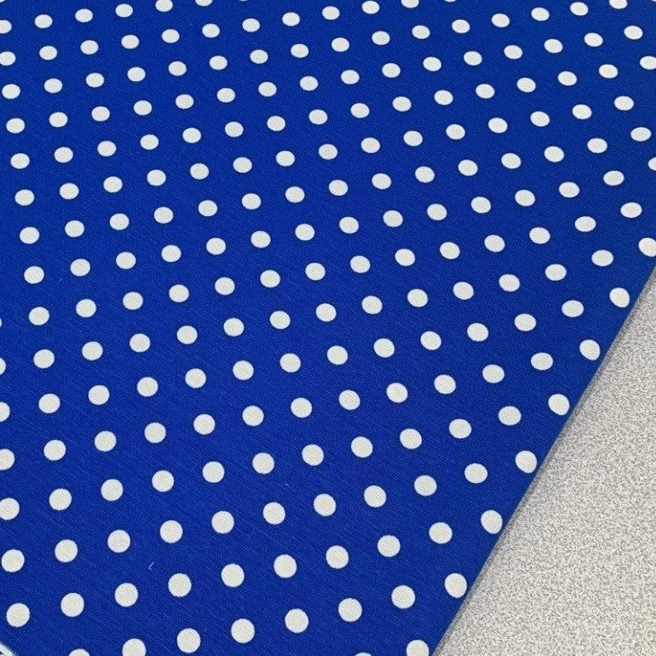 Royal blue and white spotty fabric for upholstery soft furnishing and home decor
