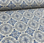 Blue navy white tile pattern cotton canvas fabric with geometric shapes and ornaments