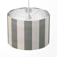 Striped lampshade with gray and white vertical stripes on a white background.