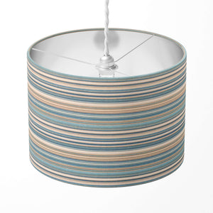 A teal blue and brown horizontal striped lampshade on a white background.