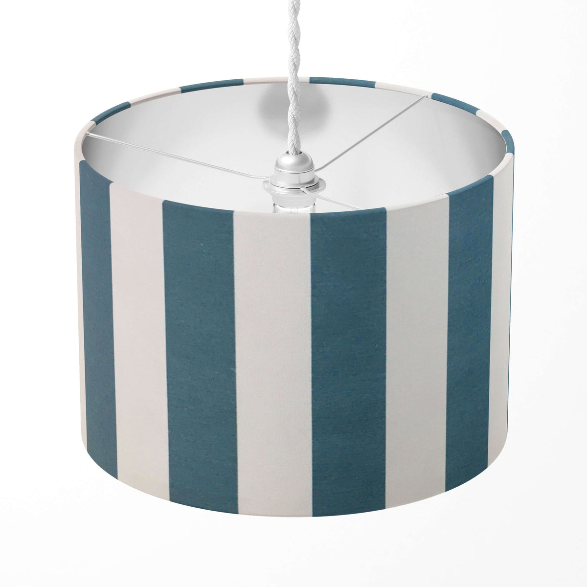 Vertical striped lampshade with teal blue and white stripes on a white background.