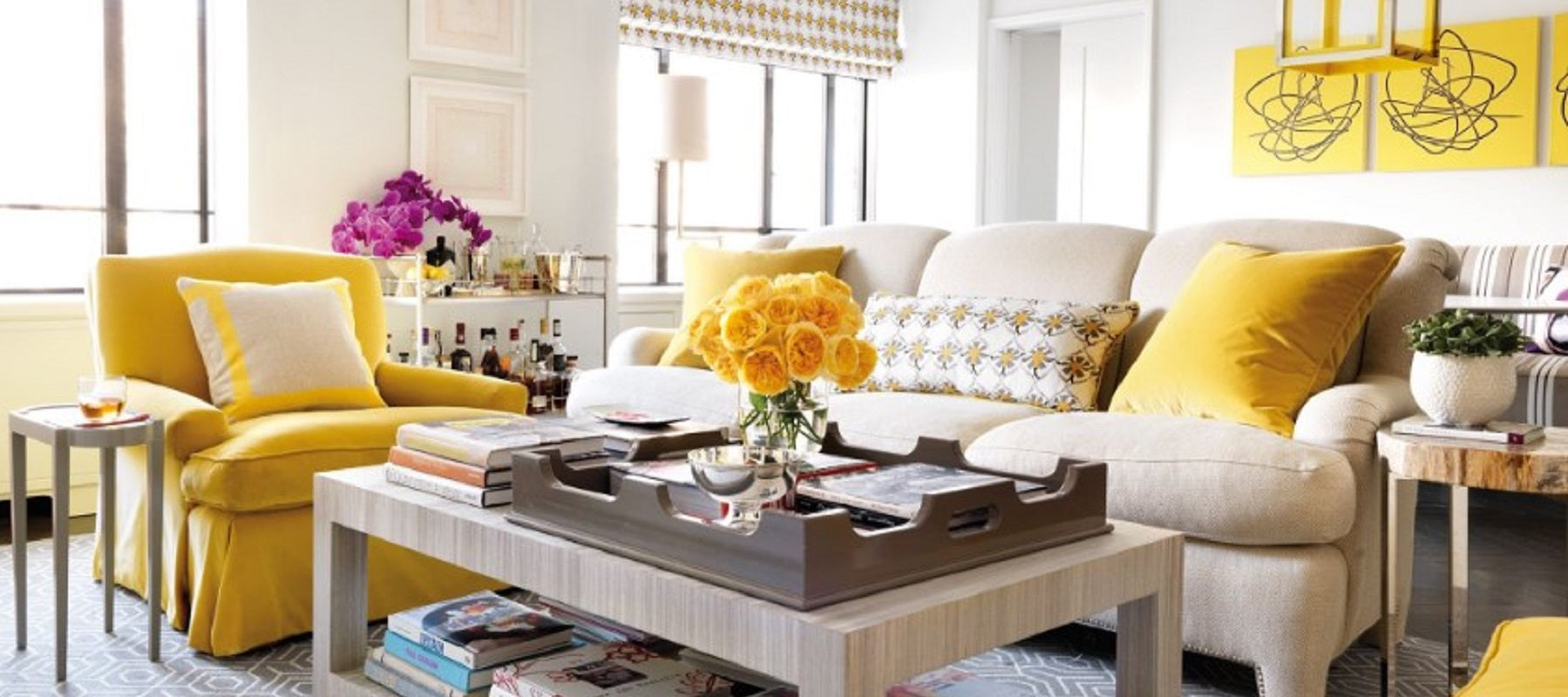 livingroom set covered with yellow and beige upholstery fabric