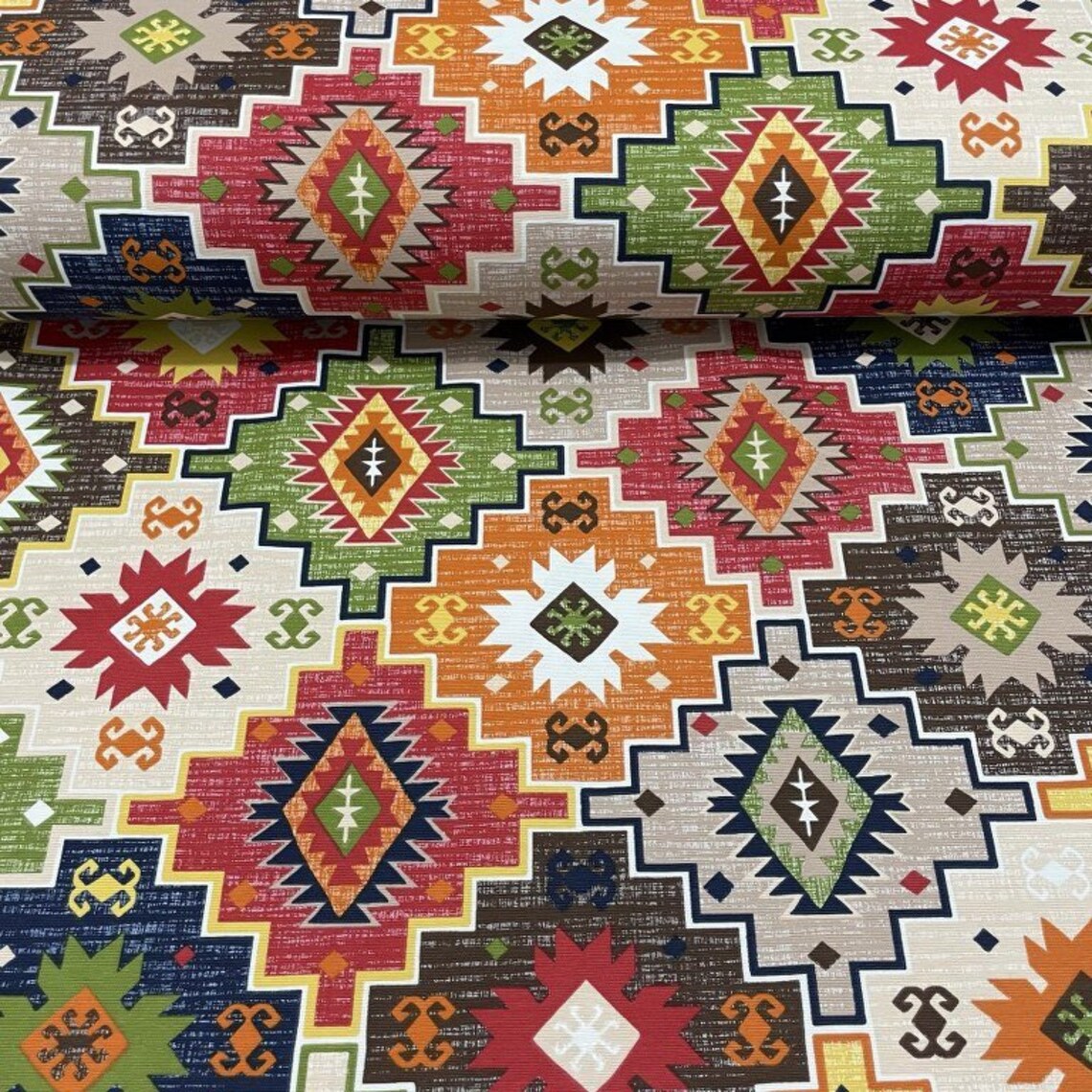 Multicolored ethnic kilim upholstery fabric featuring geometric patterns, suitable for various sewing projects.