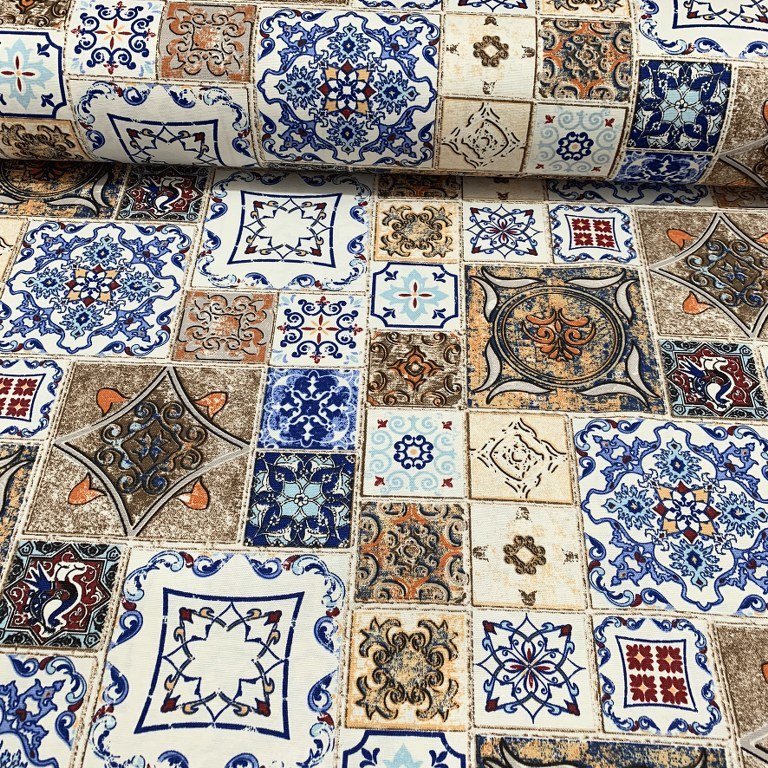 Ceramic fabric with a mosaic tile pattern featuring geometric designs in blue and brown.