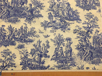 Blue toile upholstery & curtain fabric picture showing pattern repeat with a ruler.